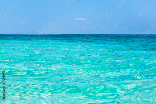Tropical sea water with bright sun light reflections © GVS