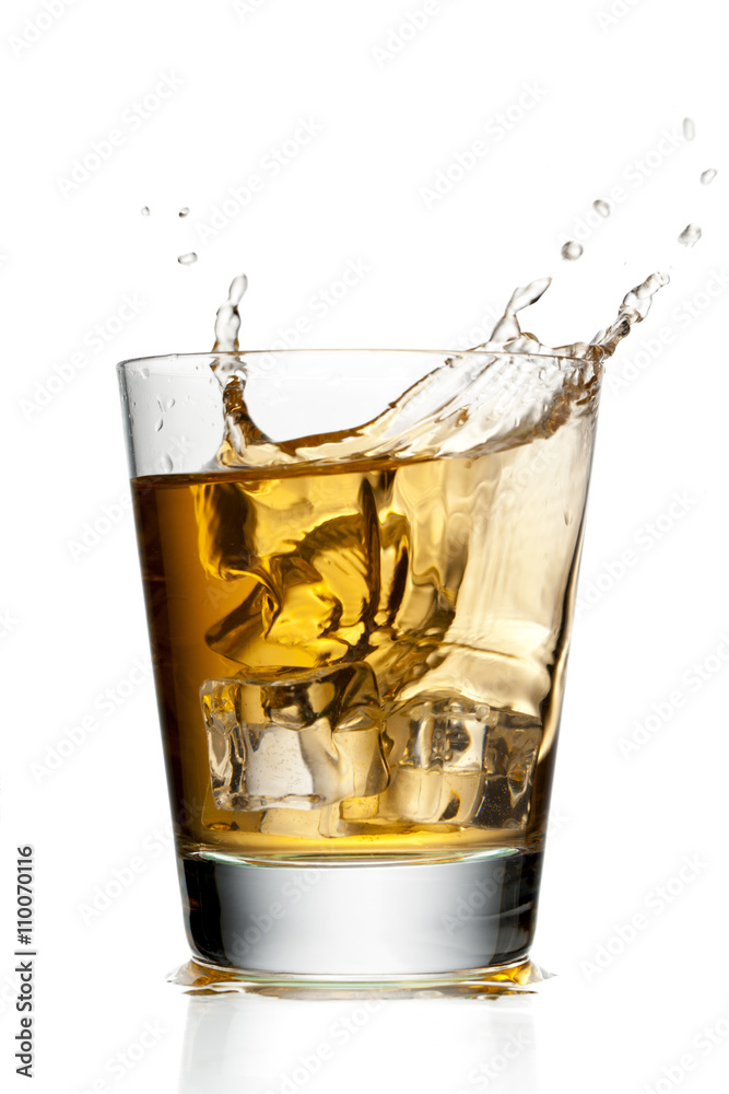 glass of apple juice with ice cubes. glass of apple juice with ice cubes.