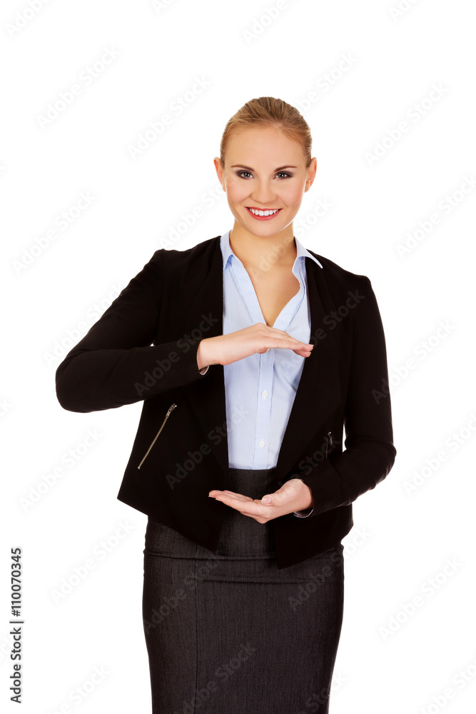 Business woman holding empty copy space between her hands Business woman holding empty copy space between her hands