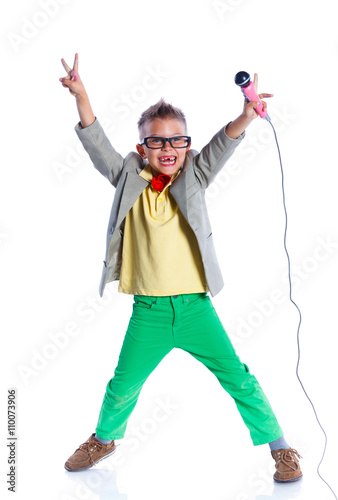 Boy singing with a microphone 