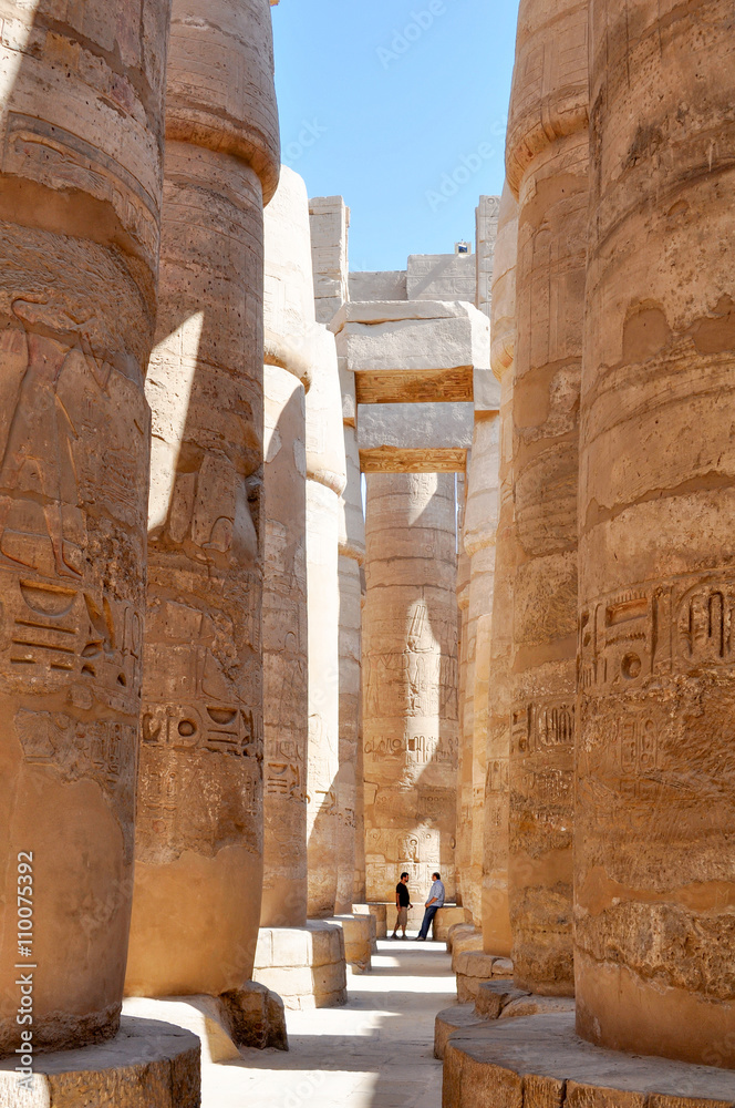 Columns painted in the Ancient temple Karnak in Luxor. Egypt. Columns painted in the Ancient temple Karnak in Luxor. Egypt.