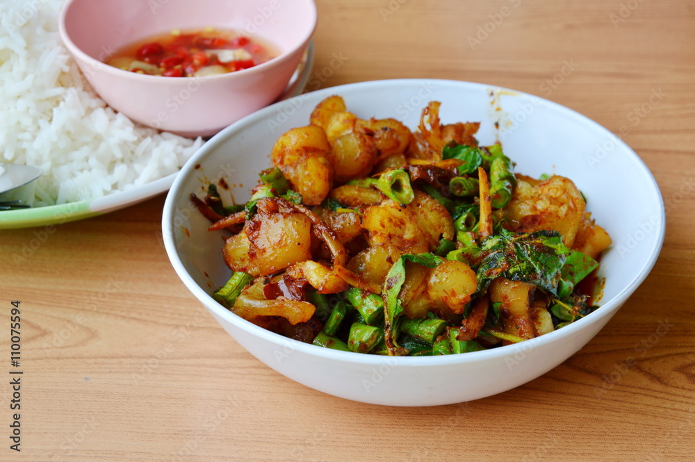 spicy stir fried pork ligament with herb and plain rice spicy stir fried pork ligament with herb and plain rice