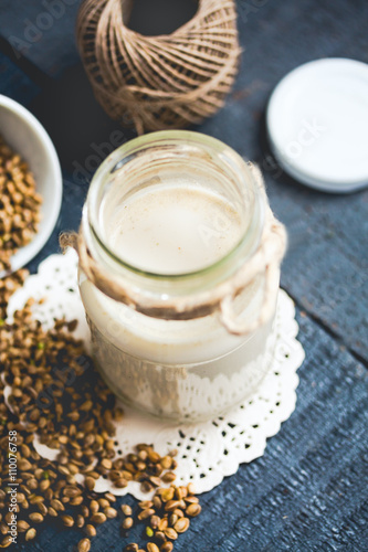vegan fresh milk from hemp seeds in a glass jar  clean eating