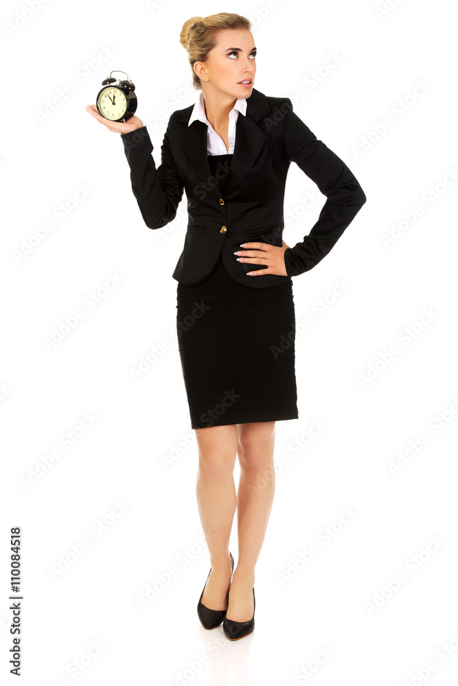 Businesswoman with clock - time concept