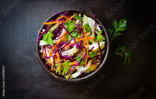 Fresh vegetables salad purple cabbage, lettuce, carrot. Top view