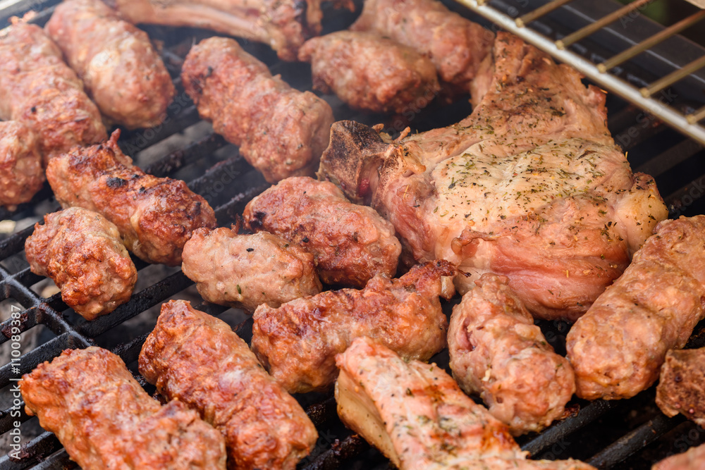 Traditional Romanian Barbecue With Pork Meat Rolls (Mici Or Mititei) Traditional Romanian Barbecue With Pork Meat Rolls (Mici Or Mititei)