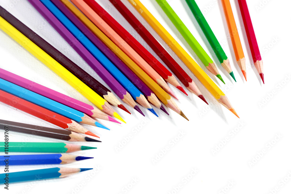 Multicolor colored pencils or crayons in white background.