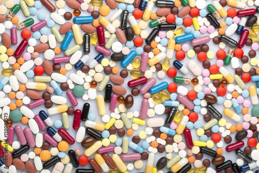 Scattered colorful medical pills and drugs Scattered colorful medical pills and drugs