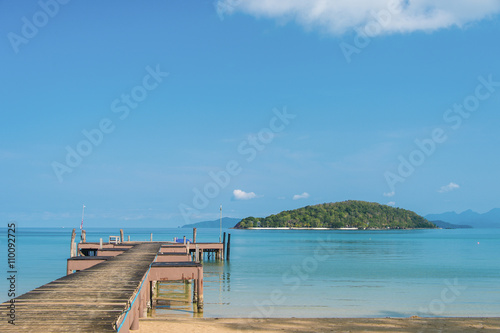 A wooden Bridge and clear blue sky and sea © peeowhy