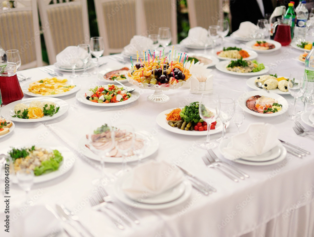 table set service with silverware and glass stemware at restaura