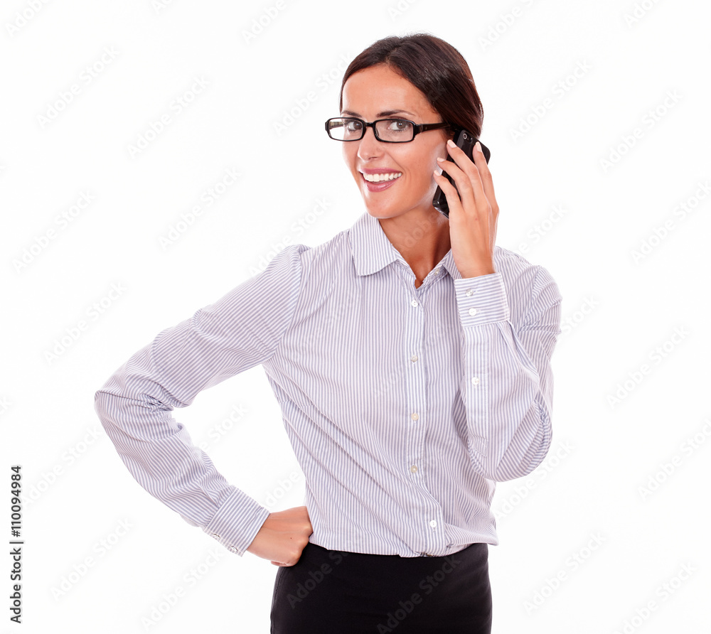 Smiling brunette businesswoman with cell phone Smiling brunette businesswoman with cell phone