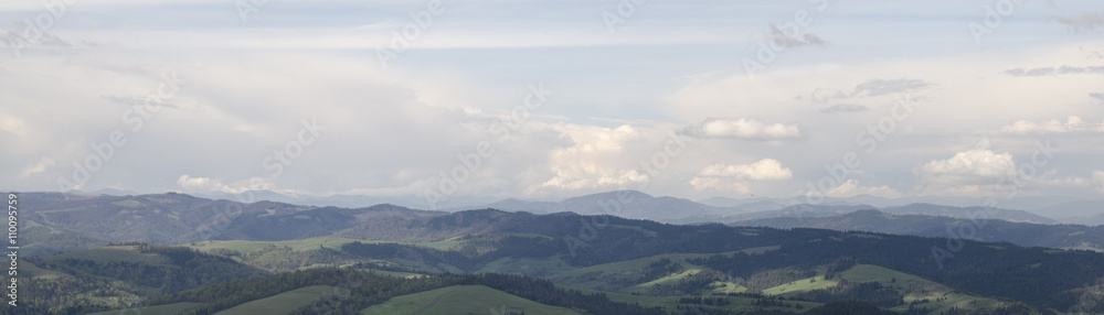 Landscape with mountains and clouds