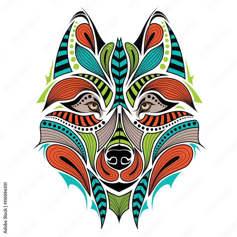 Patterned colored head of the wolf. African / indian / totem / tattoo design. It may be used for design of a t-shirt, bag, postcard and poster.