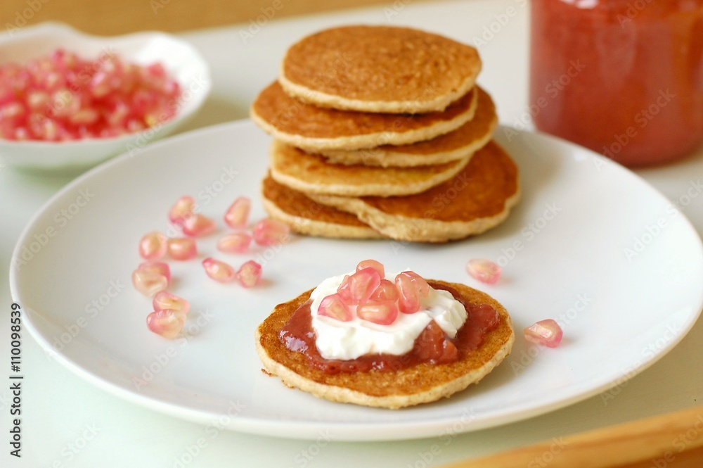 Pancakes with marmelade, pomegranate, cottage cheese and coffee