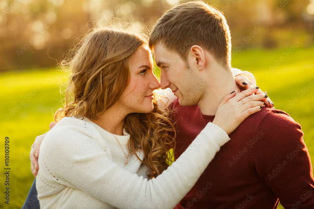 Young couple spend a weekend or holiday in park or pine forest. Young couple spend a weekend or holiday in park or pine forest.