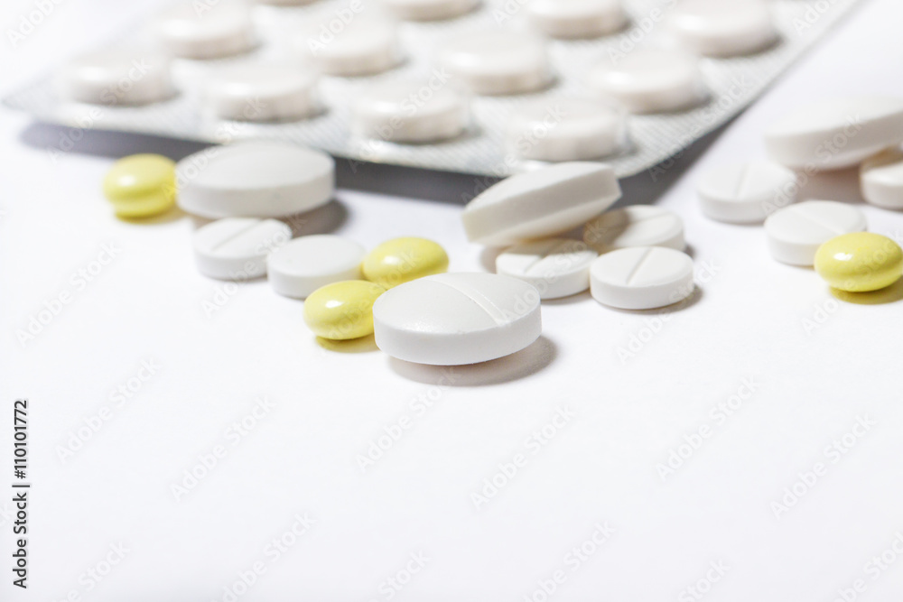 pills close up on white background. medications pills close up on white background. medications