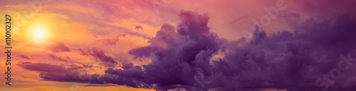 panoramic dramatic sunset with purple clouds