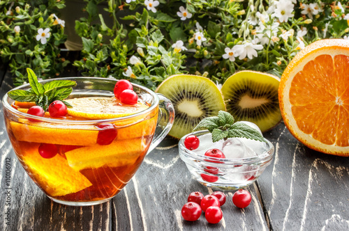 floral tea  orange  cranberry  mint  ice photo