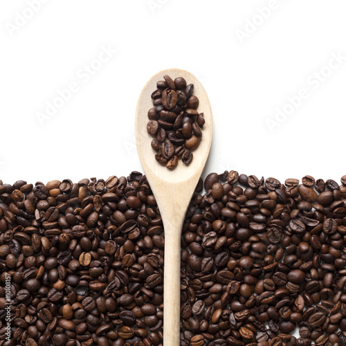 Coffee beans frame background  with wooden spoon
