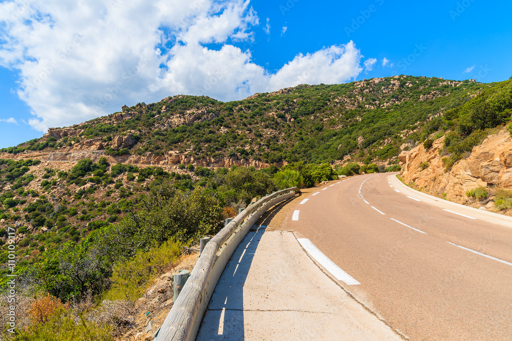 Scenic mountain road among rocks on Corsica island, France