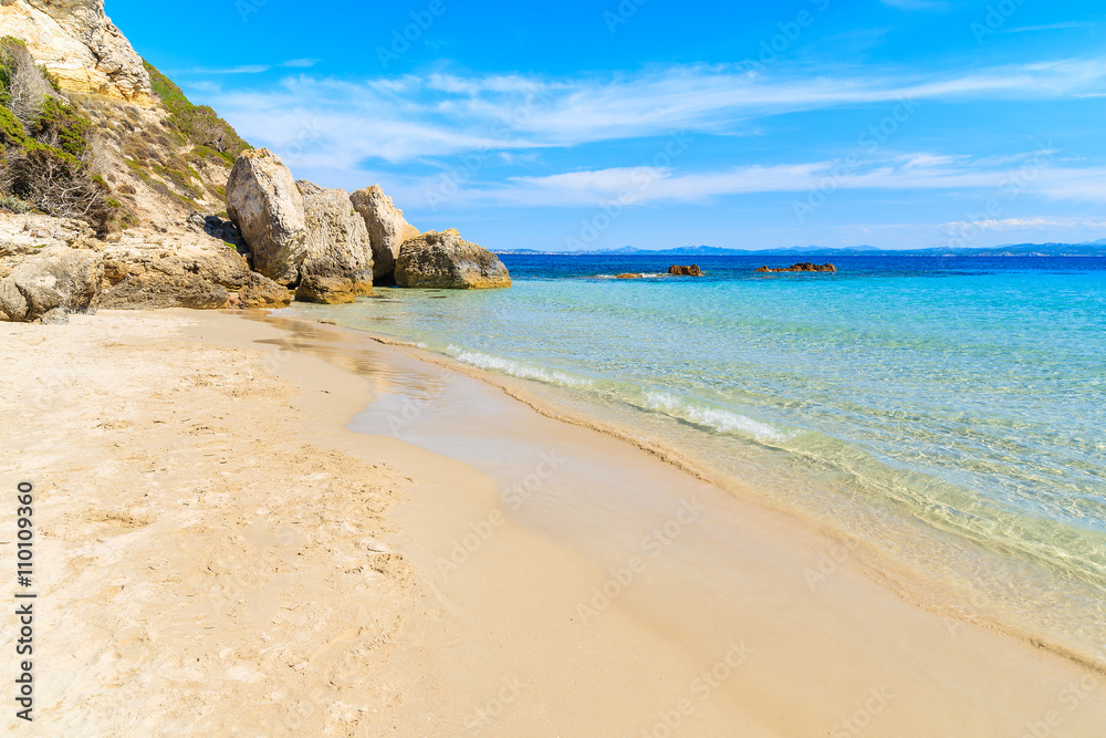 A view of idyllic Grande Sperone beach with crystal clear azure sea water, Corsica island, France