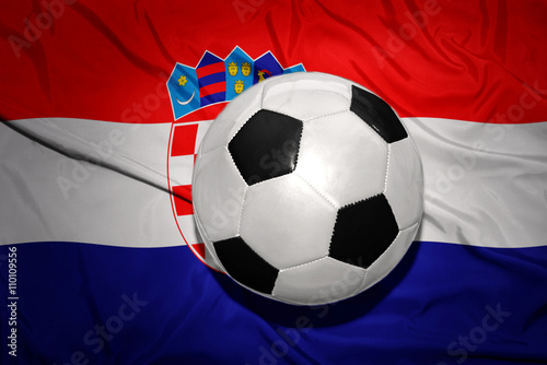 black and white football ball on the national flag of croatia