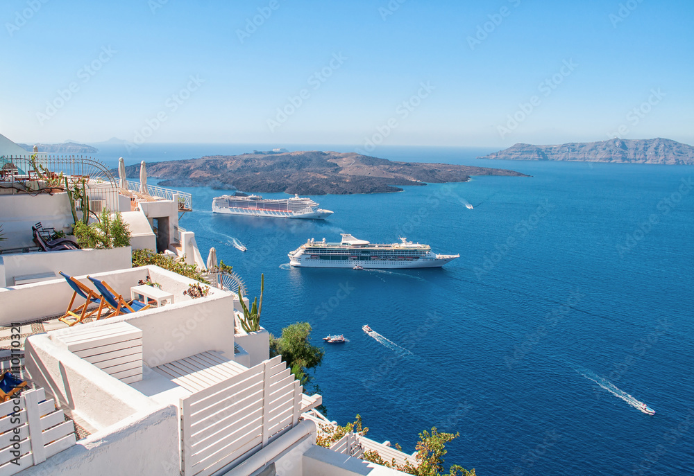 Naklejka premium White architecture on Santorini island, Greece, Europe. Beautiful view on the sea. Summer concept.
