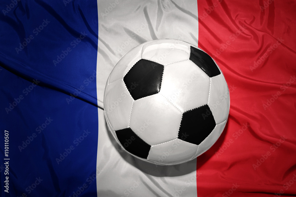 black and white football ball on the national flag of france black and white football ball on the national flag of france