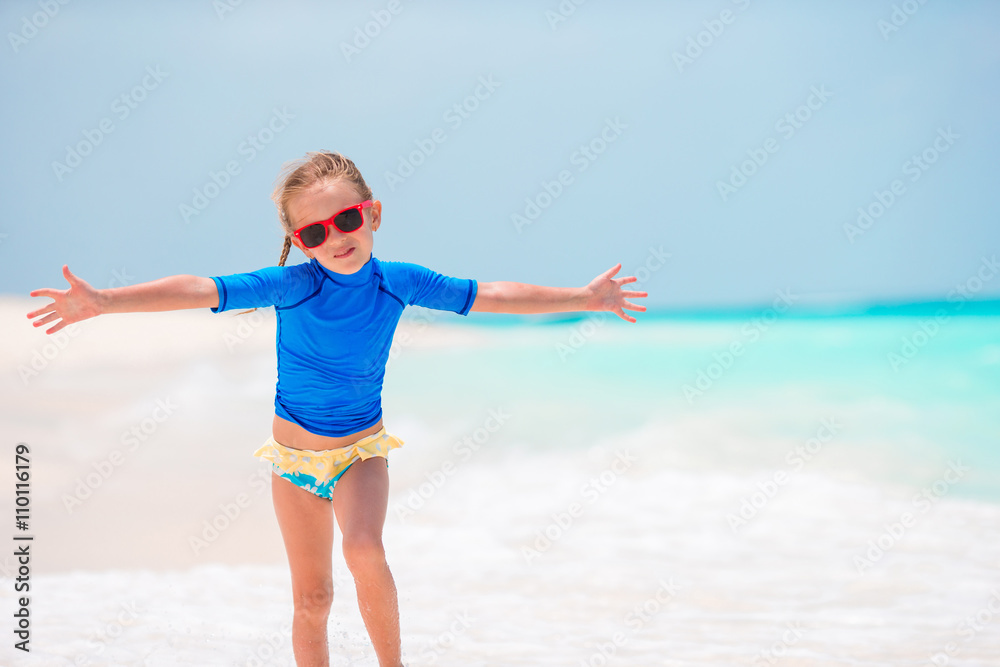 Little adorable girl on beach vacation