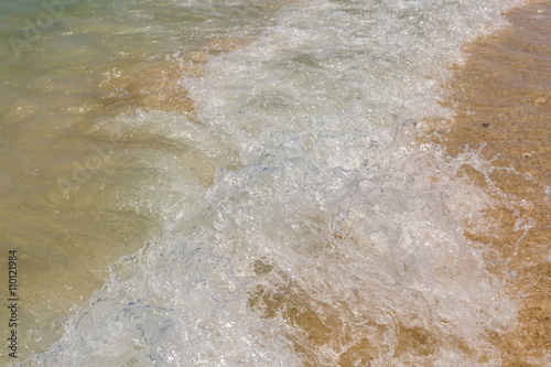 wave of the sea on sand beach