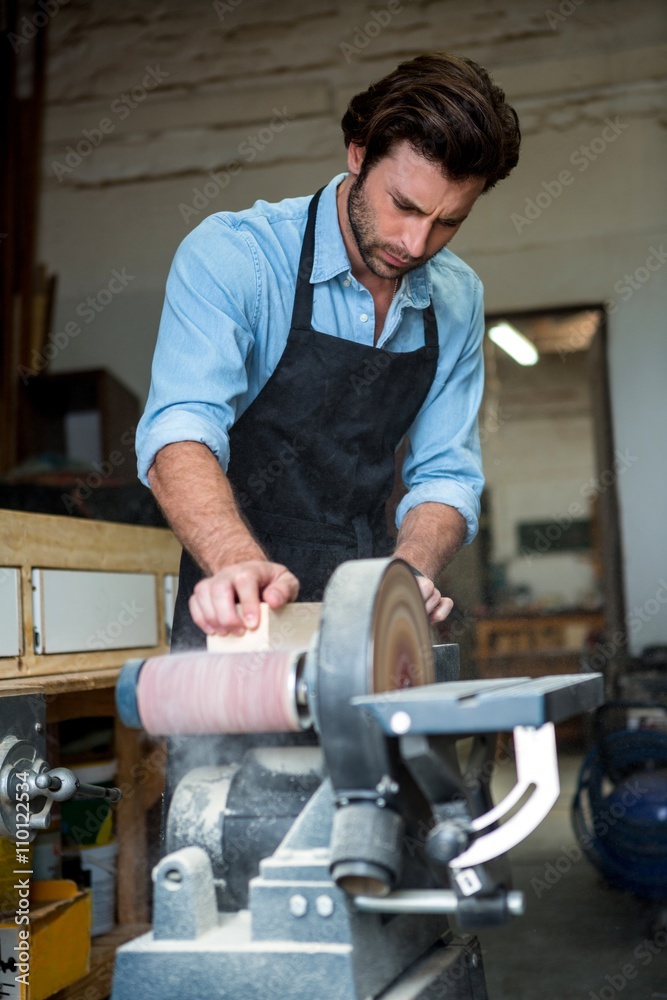 Carpenter working on his craft Carpenter working on his craft