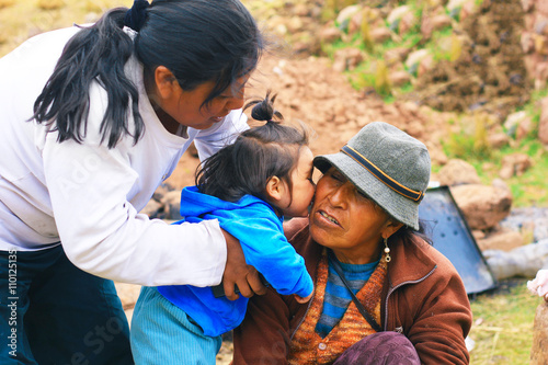 Aymara family - three generations of women photo