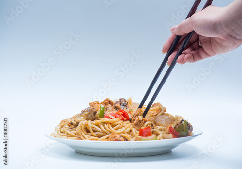Chinese noodles with a chicken and vegetables