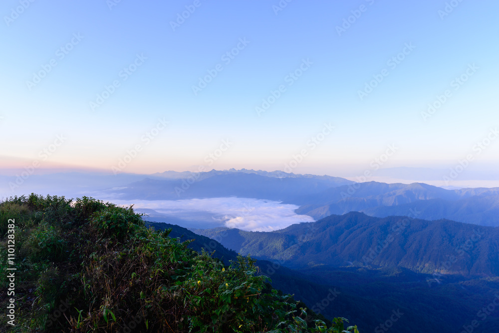 Sunrise and mist with mountain in Chiang Mai, Thailand.