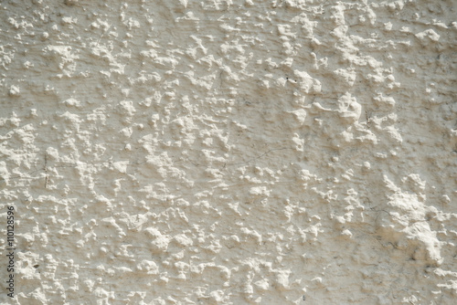 Aged cement stucco rough wall texture. Hard light.