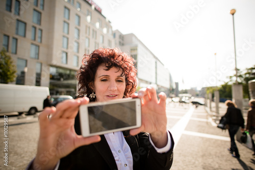 Business woman street selfie