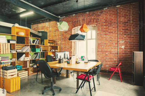 Modern office Interior with old vintage brick Wall. Art work  space