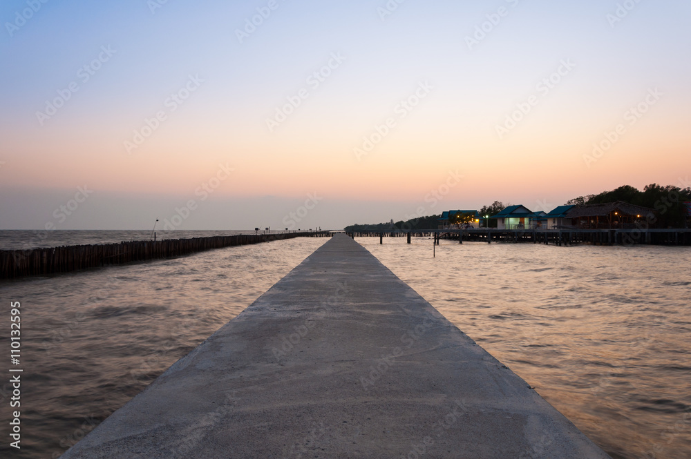seaside boardwalk in evening