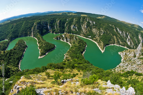 Meanders at rocky river Uvac gorge on sunny morning, southwest Serbia photo