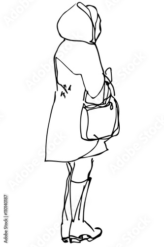 woman with a bag standing with his back to us