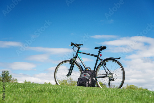 Bike in green summer meadow