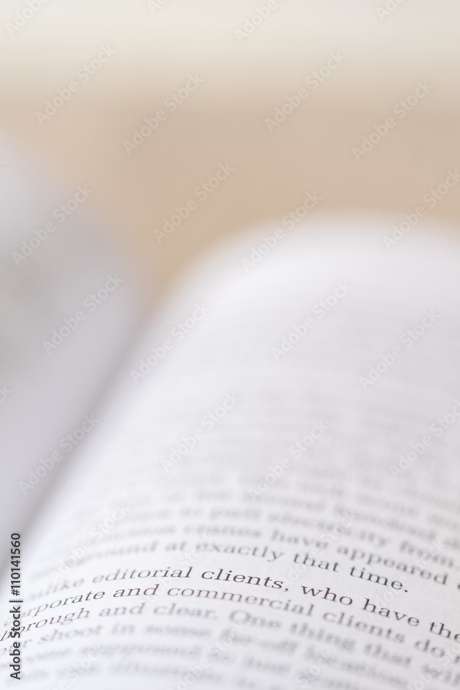 Obraz premium Macro shot of open book. Focus on word 