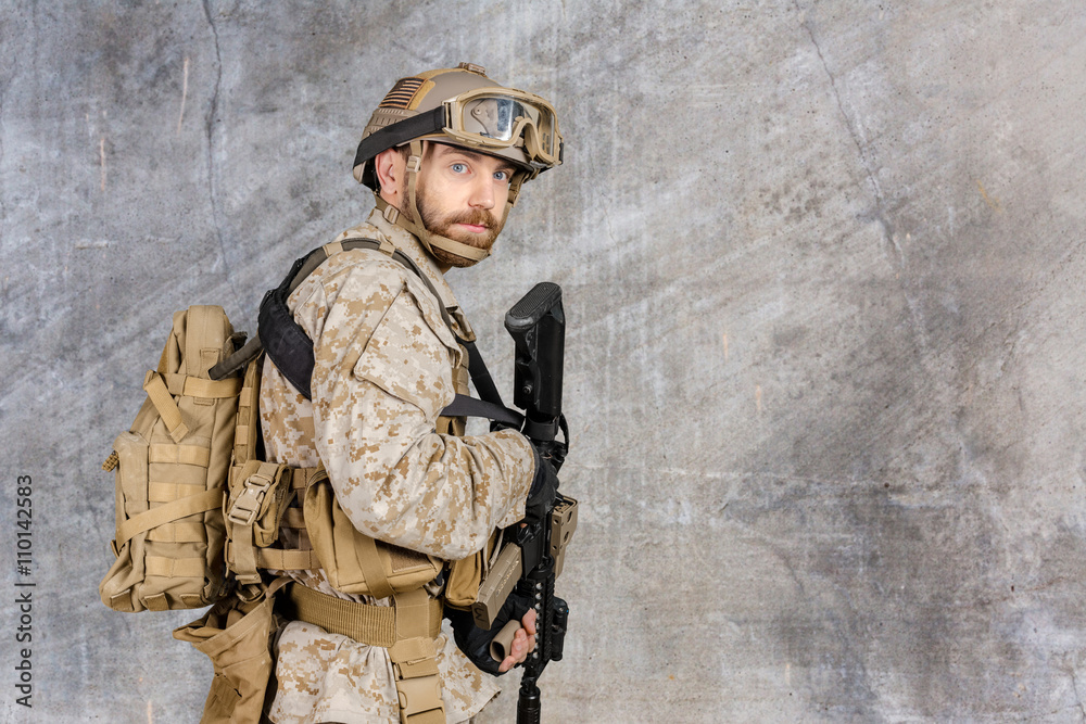 Fototapeta premium Modern soldier with rifle
