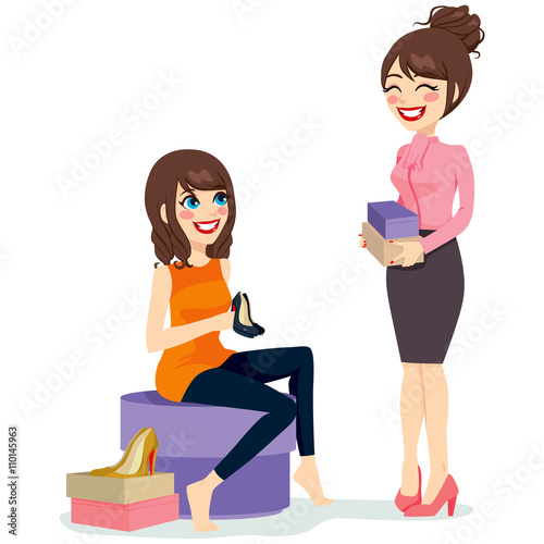 Beautiful brunette woman choosing a pair of black fashionable high heels shoes with assistance from sales clerk