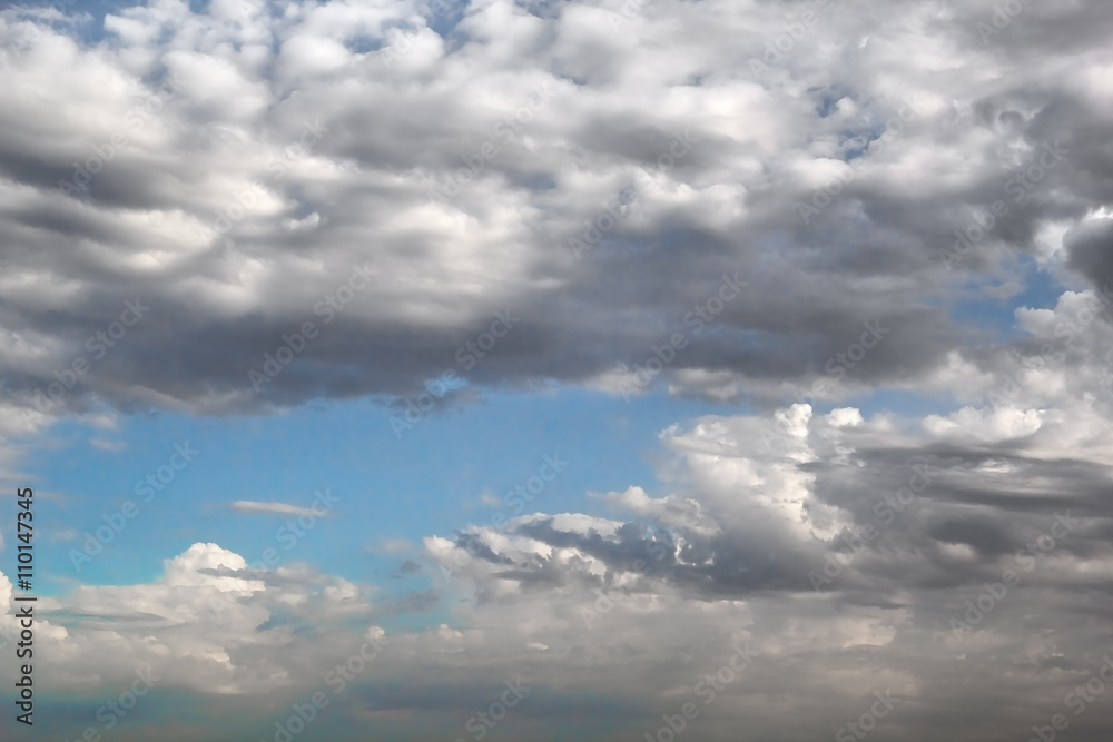 Obraz premium Rain clouds in the blue sky