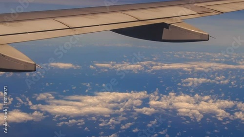 View Clouds Azure Sea under Airliner Wing
