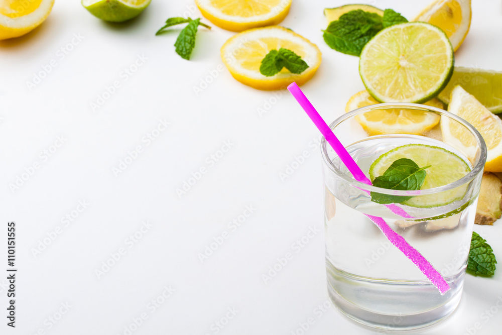 Fototapeta premium Pieces of lemon and lime on a white background.