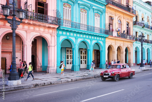 HAVANA, CUBA - APRIL 18: Classic vintage car and colorful colonial buildings in the main street of Old Havana, on April 18, 2016 in Havana © Delphotostock