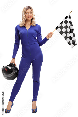 Racing woman holding a checkered race flag