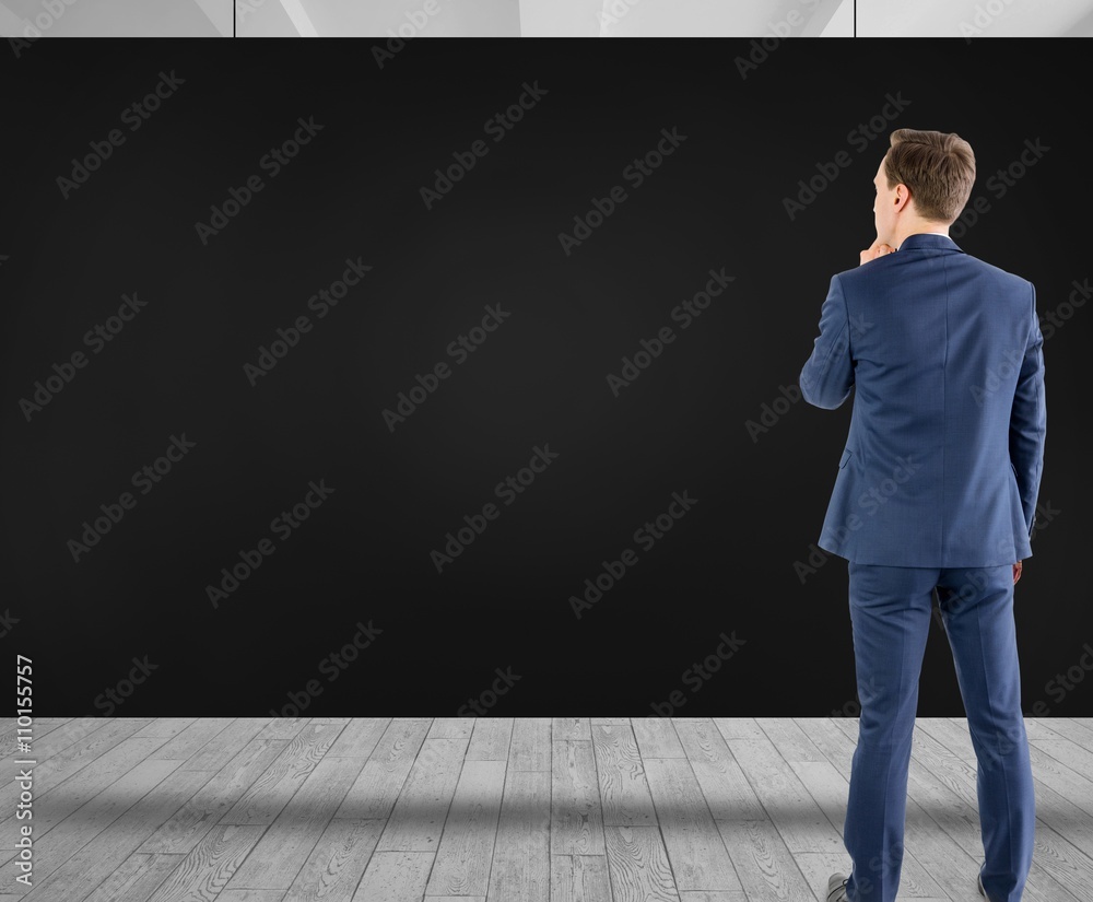 Composite image of wear view of businessman thinking Composite image of wear view of businessman thinking